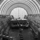 Arbete med bostadsplattformar till oljerigg och lyft till pråm för transport