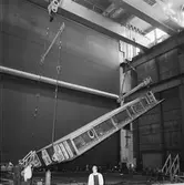 Arbete med bostadsplattformar till oljerigg och lyft till pråm för transport