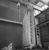 Arbete med bostadsplattformar till oljerigg och lyft till pråm för transport