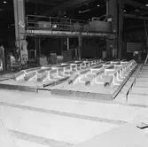 Arbete med krigsbroar i plåtverkst.