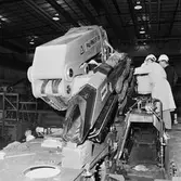 Besökande från armen till krigsbron