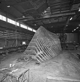 Arbete med Singapore fartyg i plastverkstan NR 1