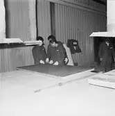 Utbildning av folk från Singapore till plastarbetare