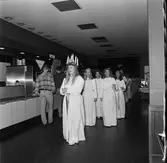 Lucia i matsalen och kontorshuset