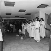 Lucia i matsalen och kontorshuset