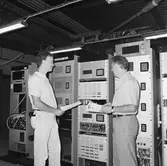 Personal på televerkst.