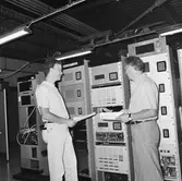 Personal på televerkst.