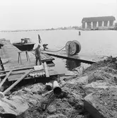 Nedläggning av elkabel i sjön mellan polhemsdockan och Skrovhallen