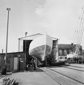 Träminsvepare utbogsering från båtskjul