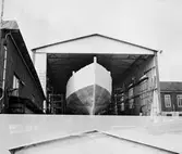 Träminsvepare utbogsering från båtskjul