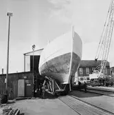 Träminsvepare utbogsering från båtskjul