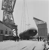 Lyft av absorptionstorn i 100 tons kranen