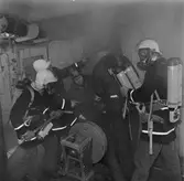 Övning med marinen och varvets brandkår