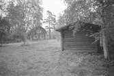 Bostadshus, Bokhållars i Tolvfors, med timrat uthus.