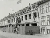 Byggnadsarbeten på Borgmästargatan i Varberg. Nils Anderssons nybyggnad, fastigheten Kvareret Timmermannen 11., Borgmästaregatan, Varberg.