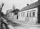 Nedre Slottsgatan från Slottsgränd, Fjärdingen, Uppsala 1901 - 1902