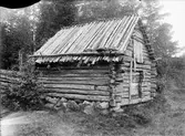 Uthus med vedtak, Uppland, sannolikt på 1920-talet