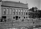 Uppsala stadsbibliotek och Centralbadets simhall under byggnation, Östra Ågatan, Uppsala maj 1941