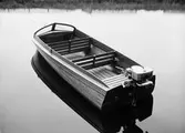 Motorbåt, sannolikt på Fyrisån, Uppsala, 1934