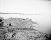 Kallbadhus vid stranden i Öregrund, Uppland, juli 1924