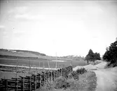 Dalgång med Tämnarån, Tierps socken, Uppland maj 1921