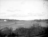 Odlingslandskap och jordbruksbebyggelse vid Vansjön i Västerlövsta socken, Uppland i oktober 1921