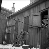 Gårdsbild vid Eklöfs skoaffär i Jönköping, år 1957.