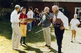 Spelemän bl.a Ivar Andersson och Henry Bensson på fiol. Plats och årtal okänt.