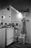 Bostadshus Roten M 11-12, okänt årtal. Köksdelen på vindsvåningen avbildad.