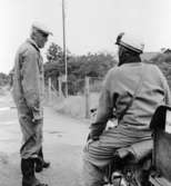 Lantbrevbärare, motorcykelåkande Holger Österberg på ön Möja
(I Stockholms skärgård) den 3/8 1956.