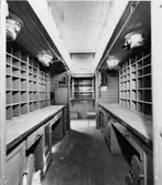 Interiör. Sorteringsfack på båda långsidorna.