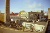 Papyrus/Stora Enso. Skorstenen, Byggnad 14 (panncentral) och byggnad 13. Taget från taket på byggnad 40.