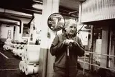 Arne Larsson i arbete på Papyrus i Mölndal, år 1990.