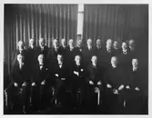 Övre raden fr v: pm POS Norberg Smedjebacken, ?, pm JK Nilsson
(Althammar) Avesta, pm SOO Mauléon Vansbro, pm LSM Torsell Älvdalen,
pm EG Widén Leksand, pm PH Sundin Sdv., pm A Hermansson Krylbo, ?, pm
JA Stenström Stv., pm AHL Lenander Rättvik, pm AR Lindh Orsa, pm CH
Tisell Borlänge. Nedre raden fr vänster: pm FNA Lindqvister Ludvika,
pm SJA Svensson Säter, pm H Danils Falun, pd EG Lannge M.D., pm Ho
Andersson Gle 1, pm CT Andrén Mora, pm A Häggbom Korsnäs.