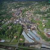 Flygfoto över pappersbruket Papyrus fabriksområde i Mölndal, 9/6 1969. I bildens högerkant syns Yngeredsfors fruktodlingar.