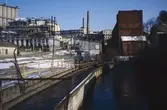 Kvarnbyfallet sett från Forsebron i Mölndal, 1970-tal. Till vänster ses Soabs fabriksbyggnader vid 
