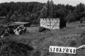 Byggnadsinventering i Lindome 1968. Gastorp 1:7.
Hus nr: 570A2068.
Benämning: två skjul.
Kvalitet: dålig.
Material: trä.
Övrigt: upplag av byggnadsmaterial (spillvirke).
Tillfartsväg: framkomlig.