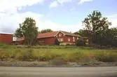 Ranntorp 2:2. Gårdsöversikt från sydväst med boningshus/loge i bakgrunden.