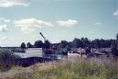 Pråm & grävmaskin i Enköpings hamn 13/8 1983