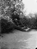 Man på trapp, sannolikt Uppland