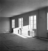 Rum med tre fönster
Interiör