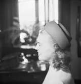 Damkläder
Kvinna med hatt