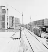 Byggarbetsplats
Exteriör, byggnader under uppförande. Lyftkranar och räls. Vinterbild.