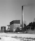 Löwenströmska lasarettet
Exteriör, ångcentral med rök mot himlen i vinterlandskap.