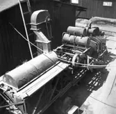 Lagerbyggnad 110 och 111 under uppbyggnad på Papyrus fabriksområde, 9/7-1946.