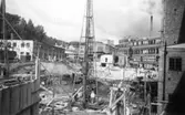 Lagerbyggnad 110 och 111 under uppbyggnad på Papyrus fabriksområde, 24/9-1945.