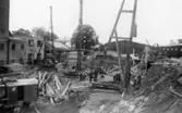 Lagerbyggnad 110 och 111 under uppbyggnad på Papyrus fabriksområde, 24/9-1945.