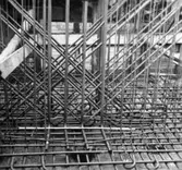 Lagerbyggnad 110 och 111 under uppbyggnad på Papyrus fabriksområde, 4/12-1945.