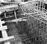 Lagerbyggnad 110 och 111 under uppbyggnad på Papyrus fabriksområde, 4/12-1945.