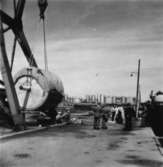 PM3 Yankeecylinder, transport - sjö.
Grupp okända män.